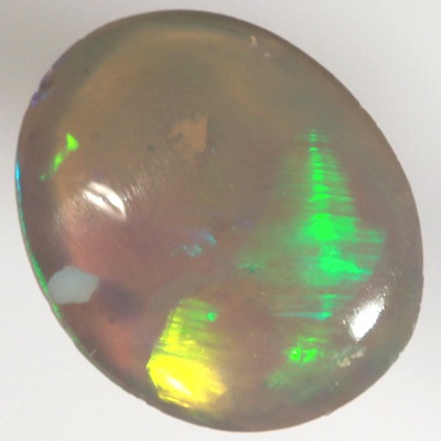 SOLID CRYSTAL OPAL Bright rolling flashes, green and yellow